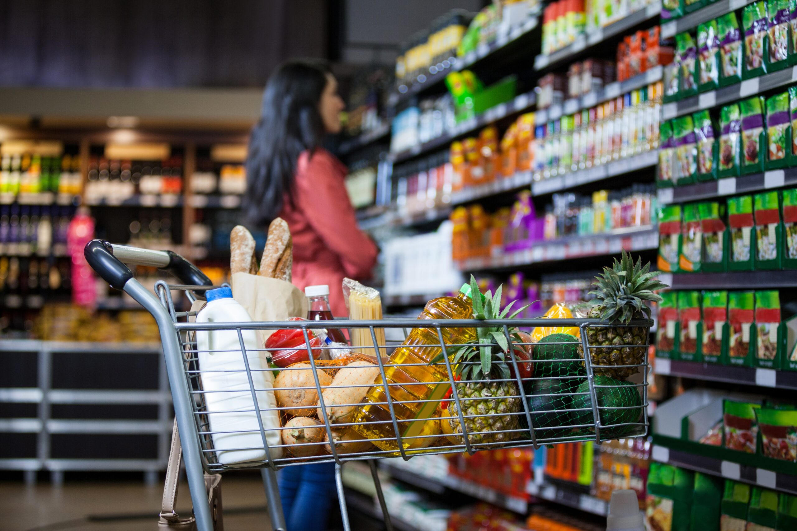 Various groceries in shopping cart